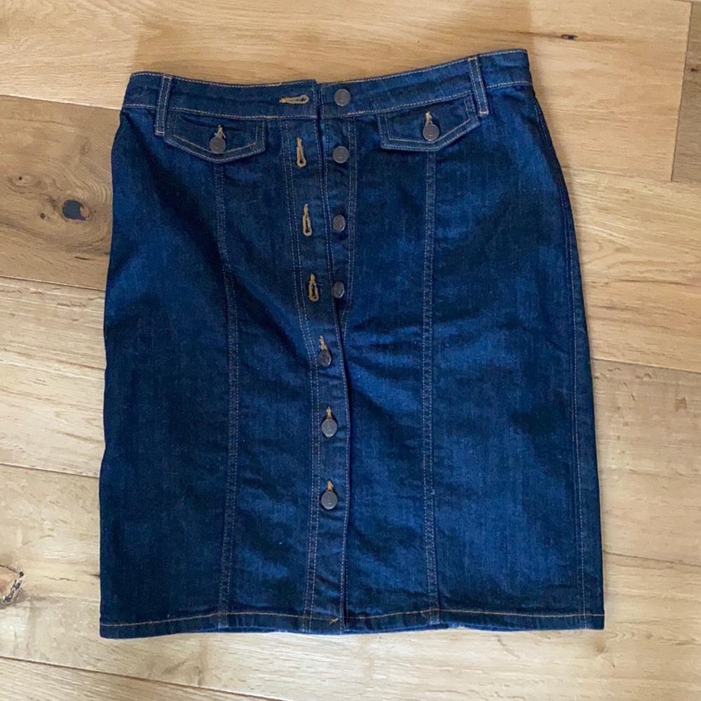 Jean skirt. Length hits just above the knee.